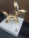 Jeff  Koons (after) - Balloon dog (gold).