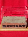 Banksy (attributed)  - Brick