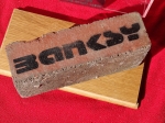 Banksy (attributed)  - Brick