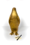 Small cloned gold penguin with water bottle