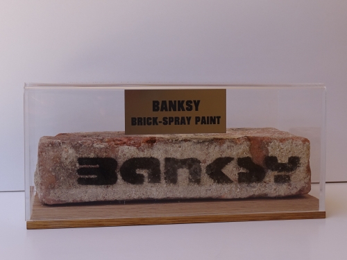 Banksy (attributed)  - Brick