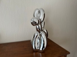 Jeff  Koons (after) - Balloon dog (silver).