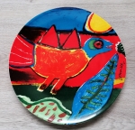 Assiette avec oiseau